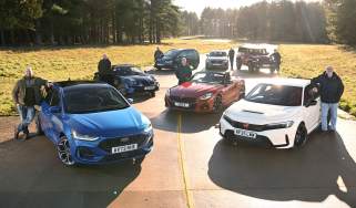 Auto Express team members standing with their favourite outgoing cars